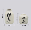 Hauptdekoration Handarbeit Zeichnung Gesichter gemalt Bild abstrakte Gesichter dekorative Keramik Gesicht Vase